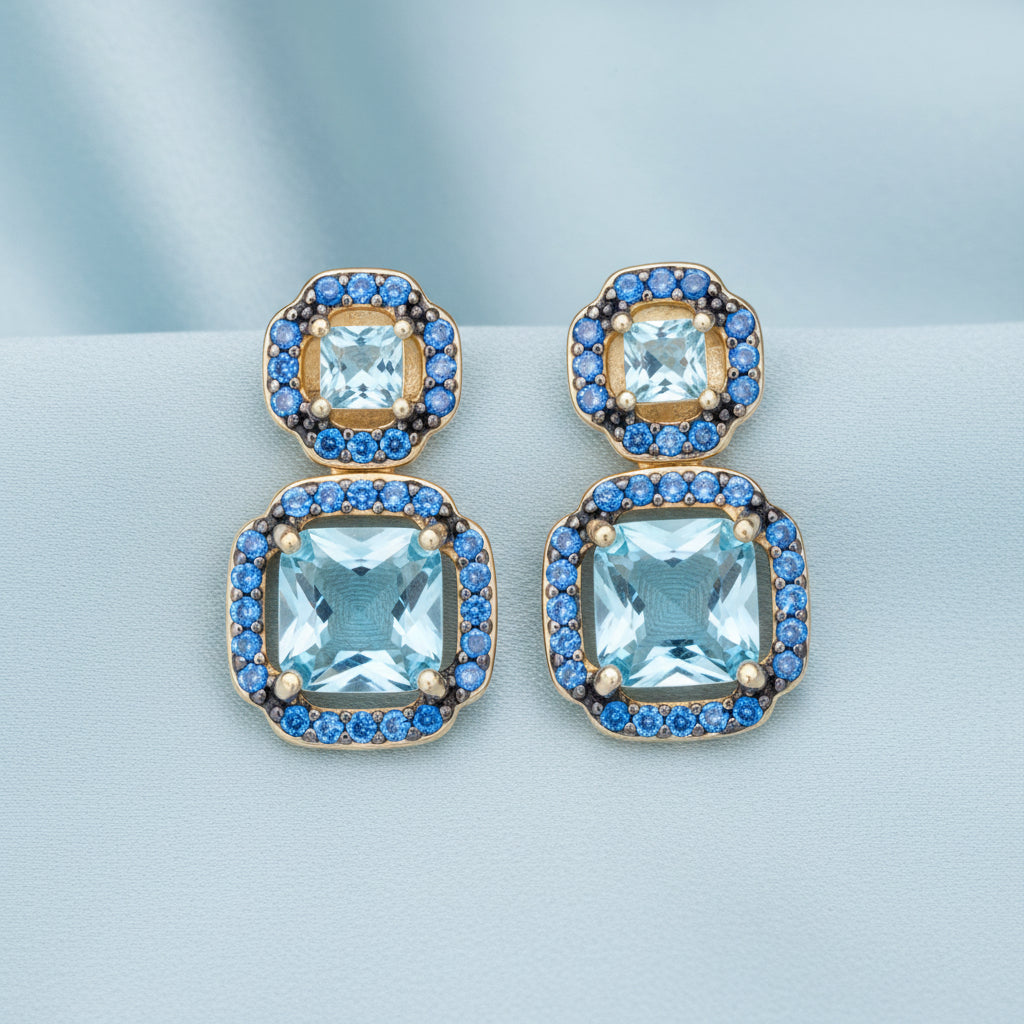 Orecchini Ara Macao in argento 925 placcato oro giallo 18 kt e zirconi azzurri e blu