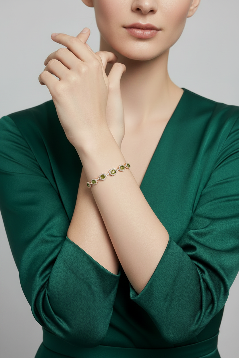 Bracciale Triad in argento 925 placcato oro giallo 18 kt e pietre color verde peridoto